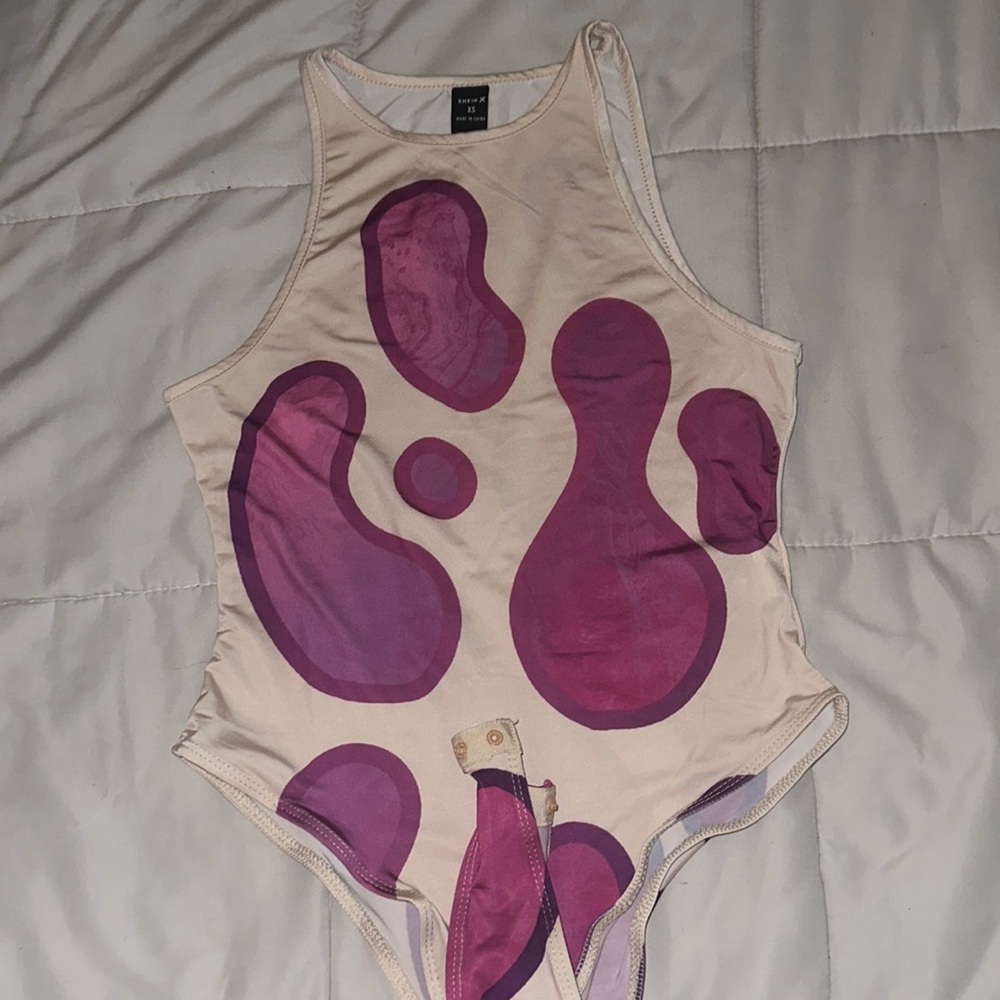 Pink and brown body suit